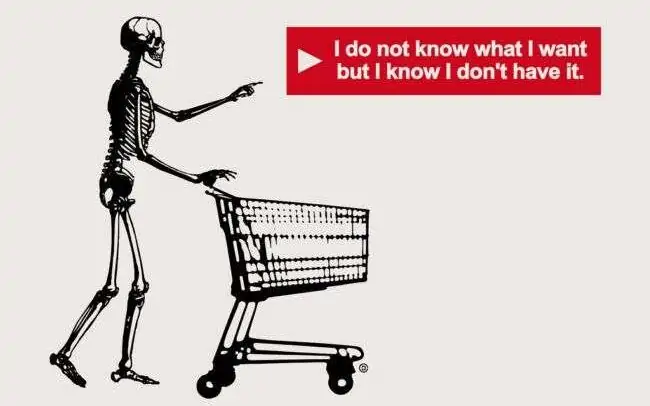 szkielet prowadzacy wózek wskazujący na napis "I do not know what i want but i know i don't have it